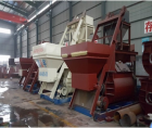 Stationary twin shaft concrete mixer