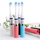 Slim battery operated travel electric toothbrush